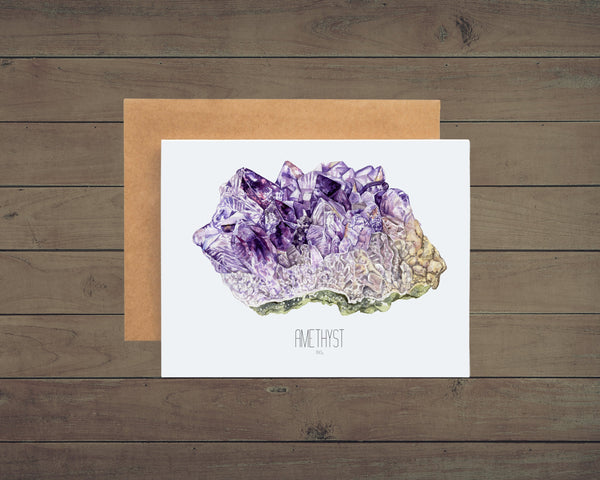 Amethyst Illustration on a white notecard with a kraft envelope, wood background